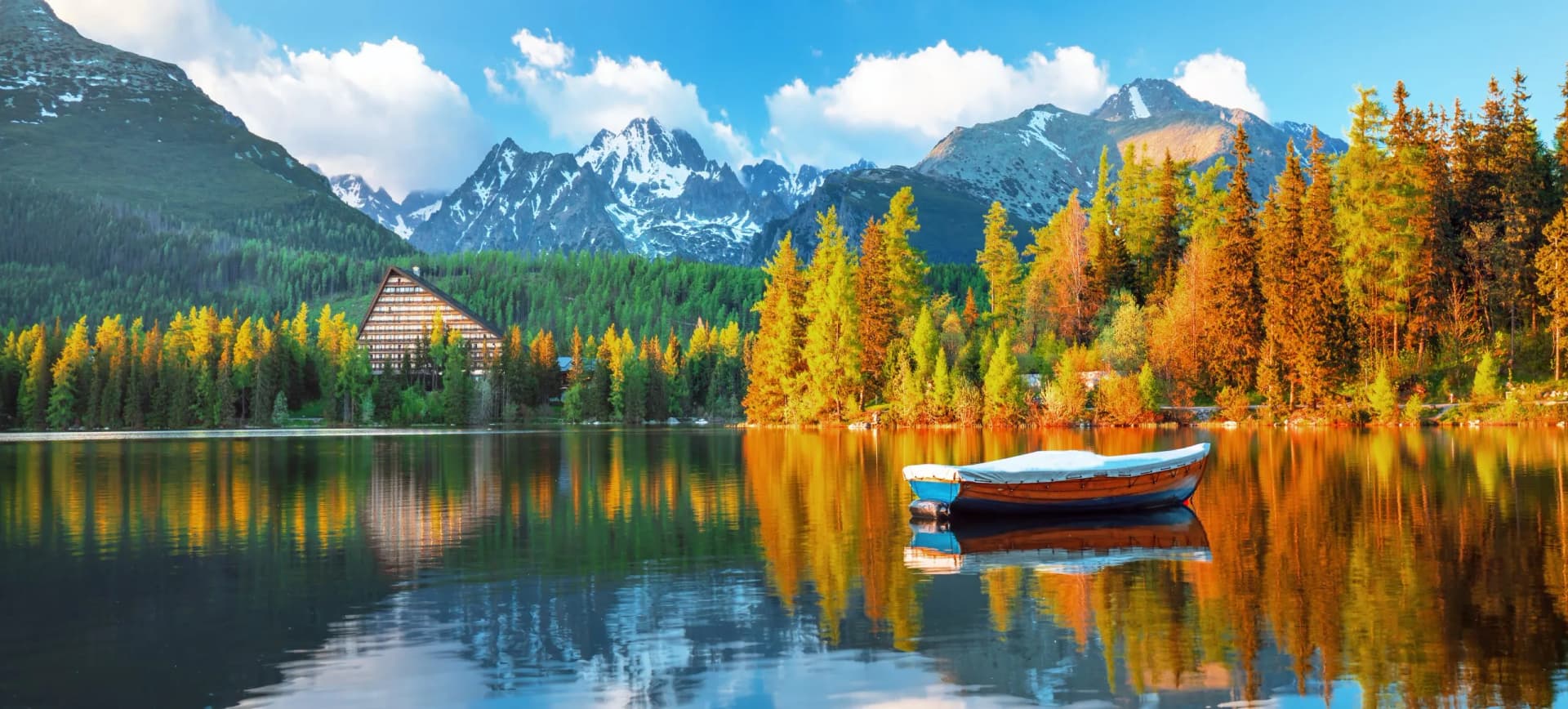 Beautiful sunrise view in High Tatras mountains national park and Strbske pleso  (Strbske lake) beautiful mountain lake in Slovakia
