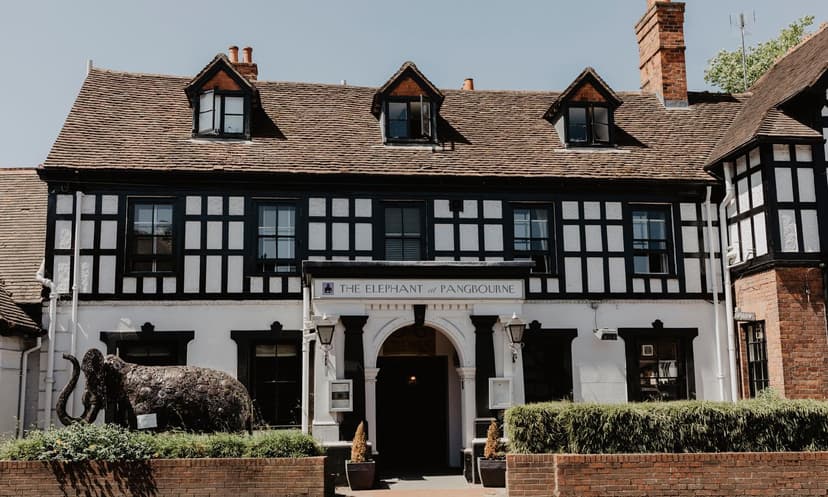 The Elephant Hotel in Pangbourne with black and white Tudor-style facade and elephant statue.