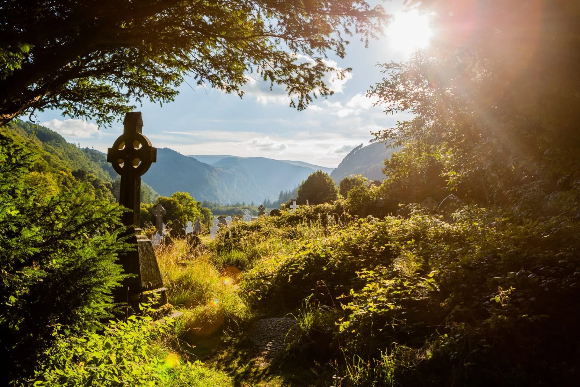 Old Celtic Cross in Glendalough, Wicklow mountain, Ireland