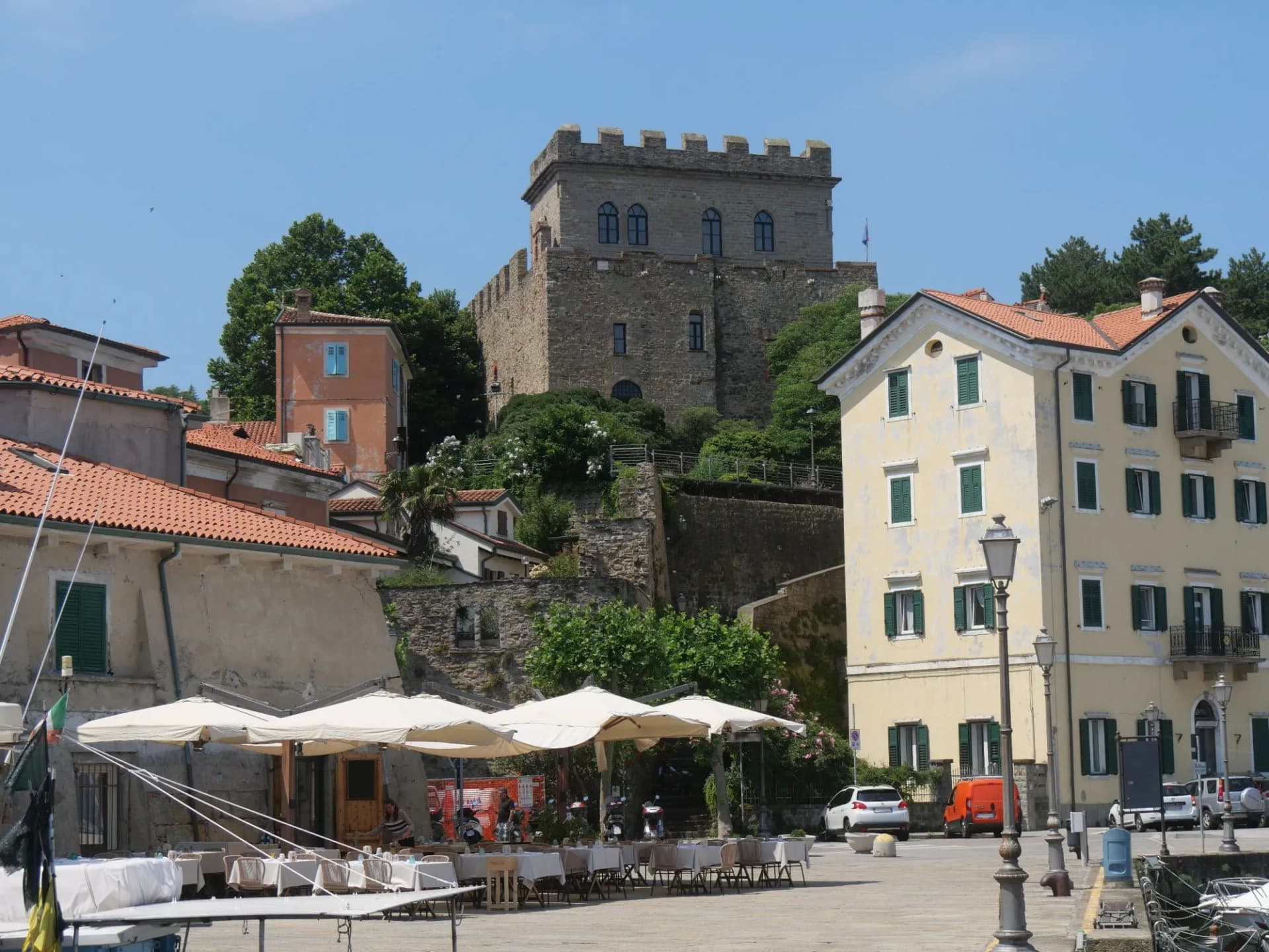 Castle in Muggia :  the building was built in a dominant position on the port and it has a stone tower