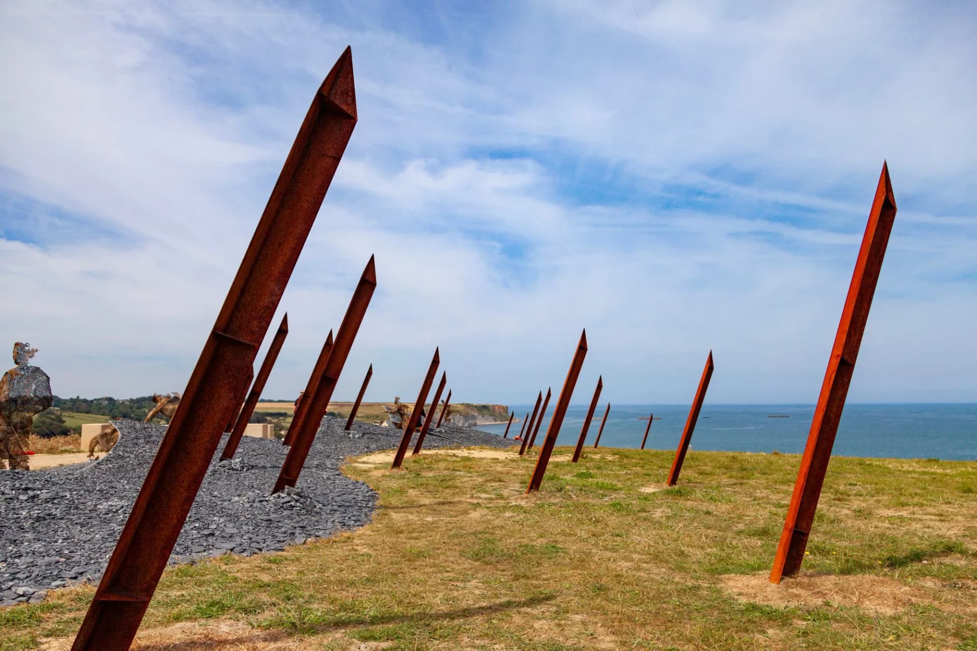 World War II era military posts on the coast of Arromanches Normandy posts on the beach