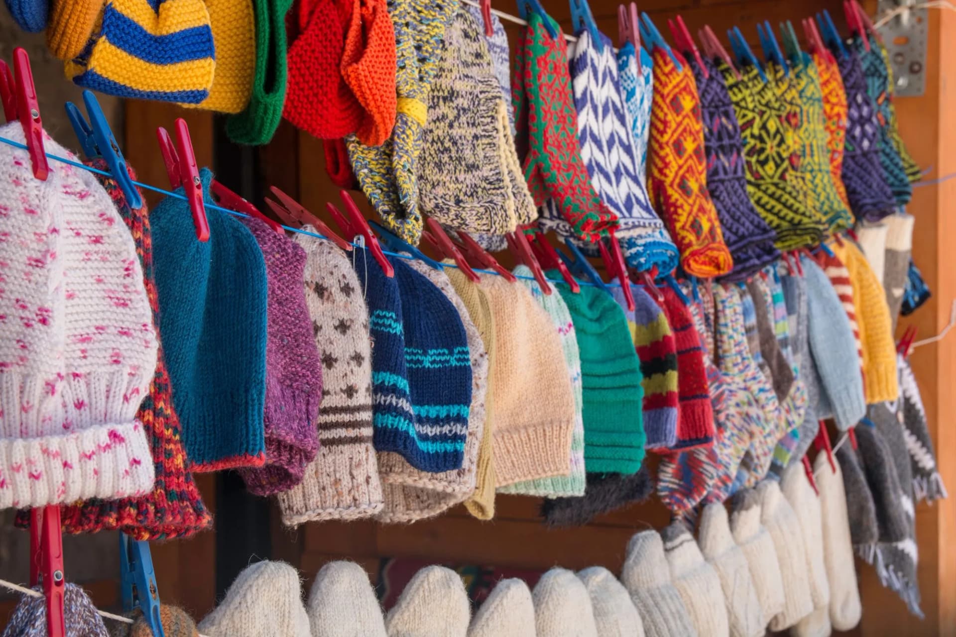 Handmade knitted items made of wool, hats, scarves, socks