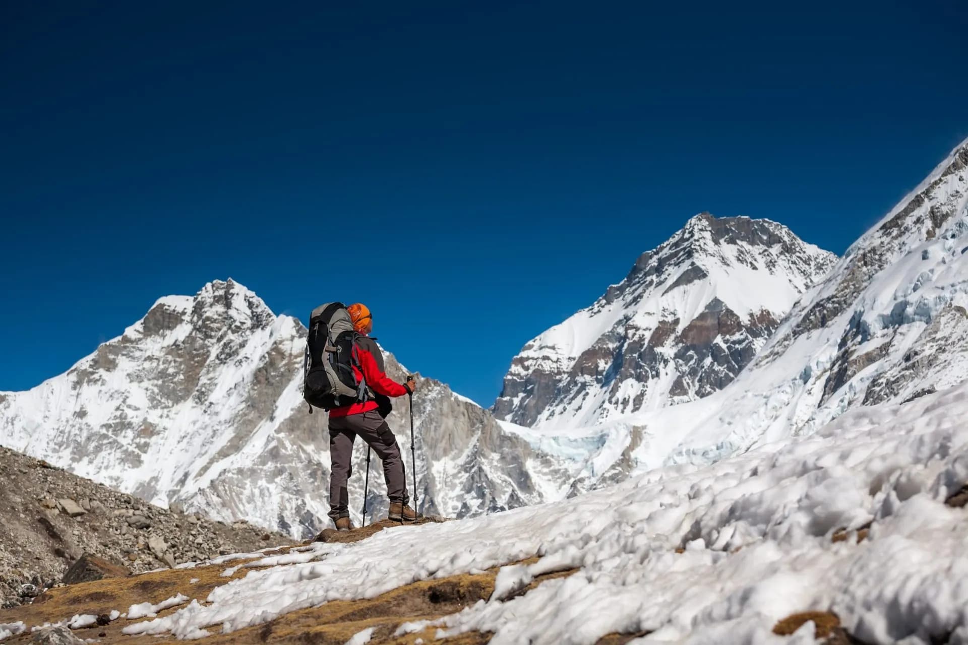Trekker approaching PumoRi mountain in Khumbu valley on a way to Everest Base camp