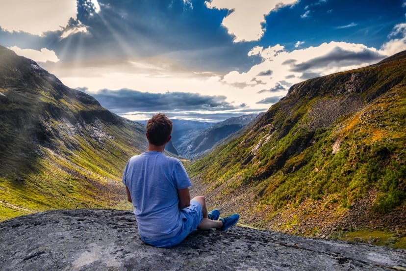 Man hiking in the mountains in Kleadalen, Aurland, Flaam - in Norway