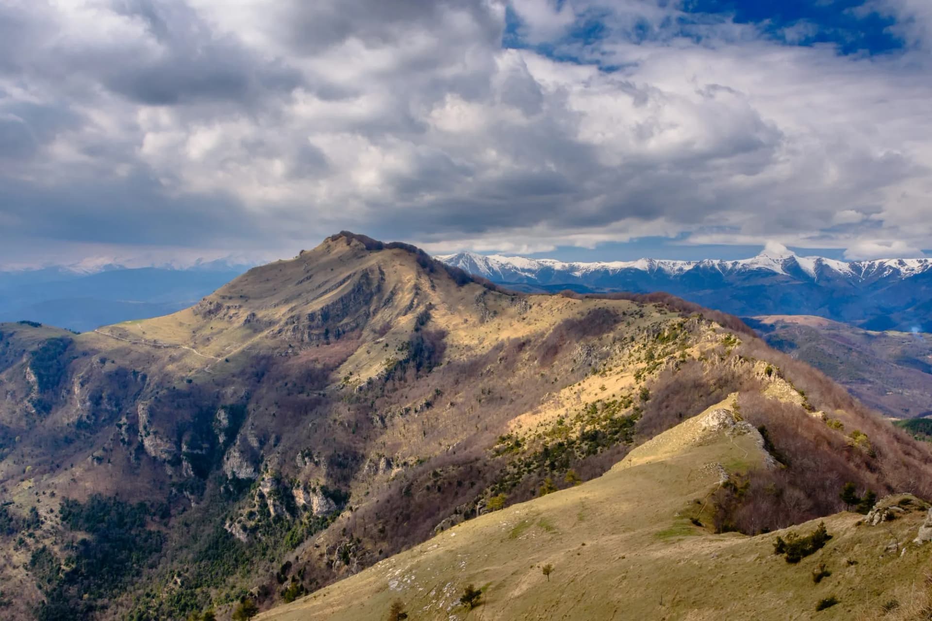 Comanegra Peak and the white Pyrenees Mountains in the background (Costabona Peak)