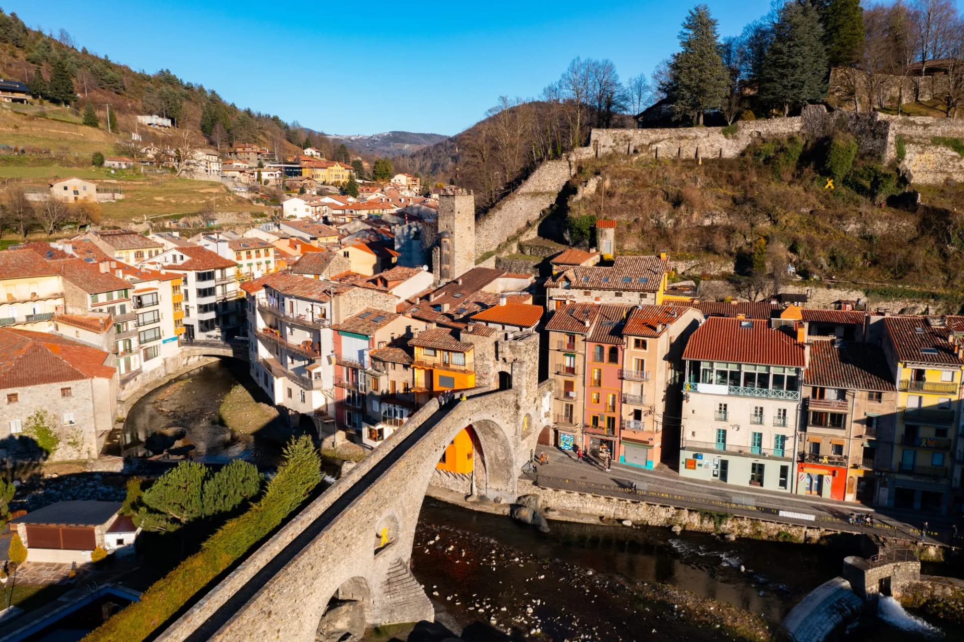 Picturesque Camprodon town in Pyrenees with stone bridge over Ter river, Girona, Catalonia.