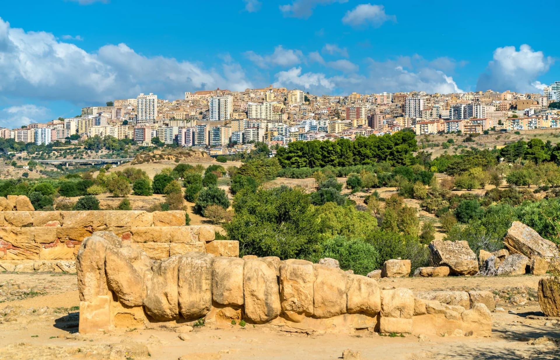 Fallen statue of Atlas at the Temple of Olympian Zeus in the Valley of Temples near Agrigento, Sicily