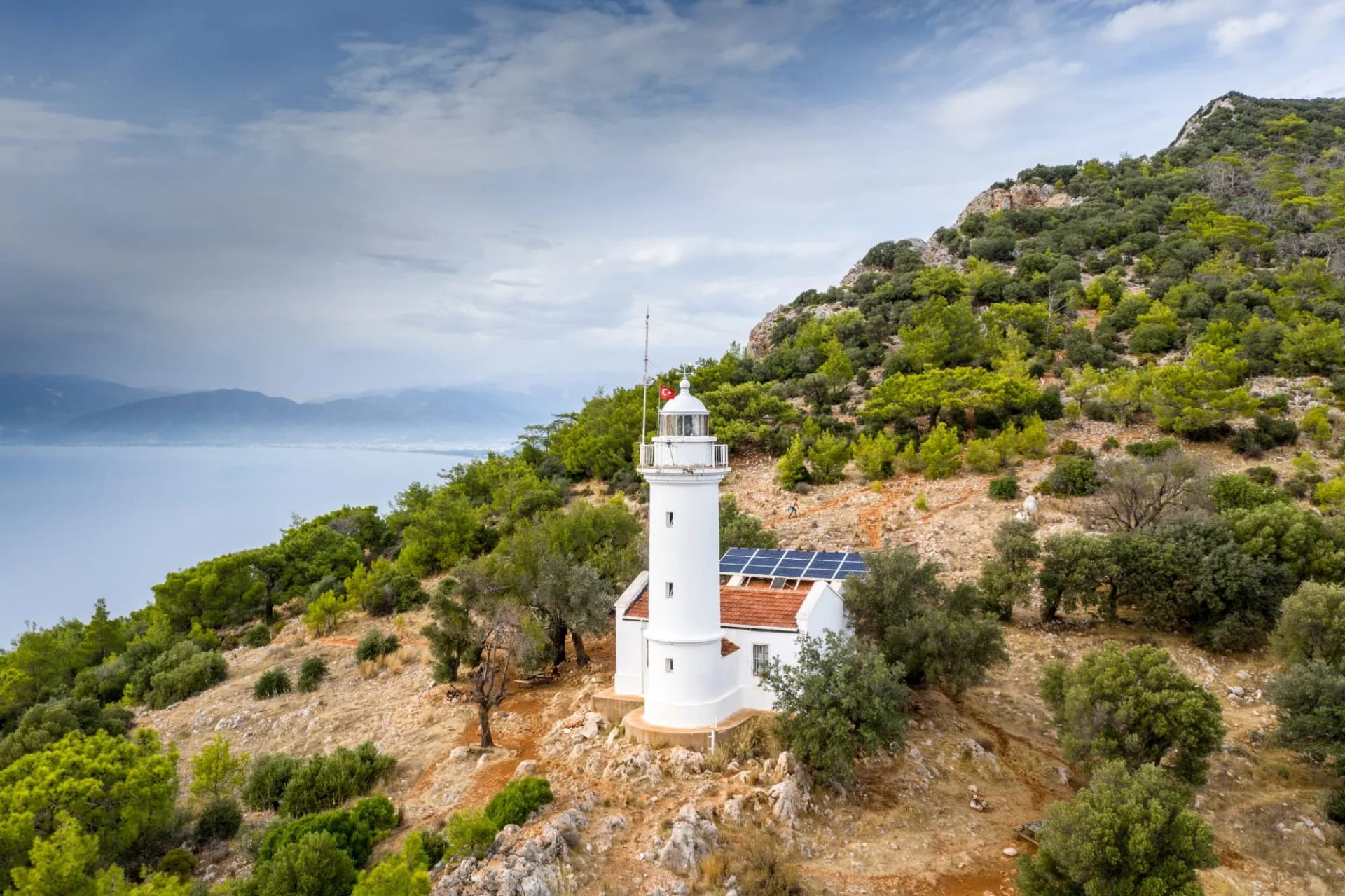 Gelidonya Lighthouse at cape in Mediterranean sea. Lighthouse and three Islands on Lycian Way in. Karaoz, Antalya, TURKEY