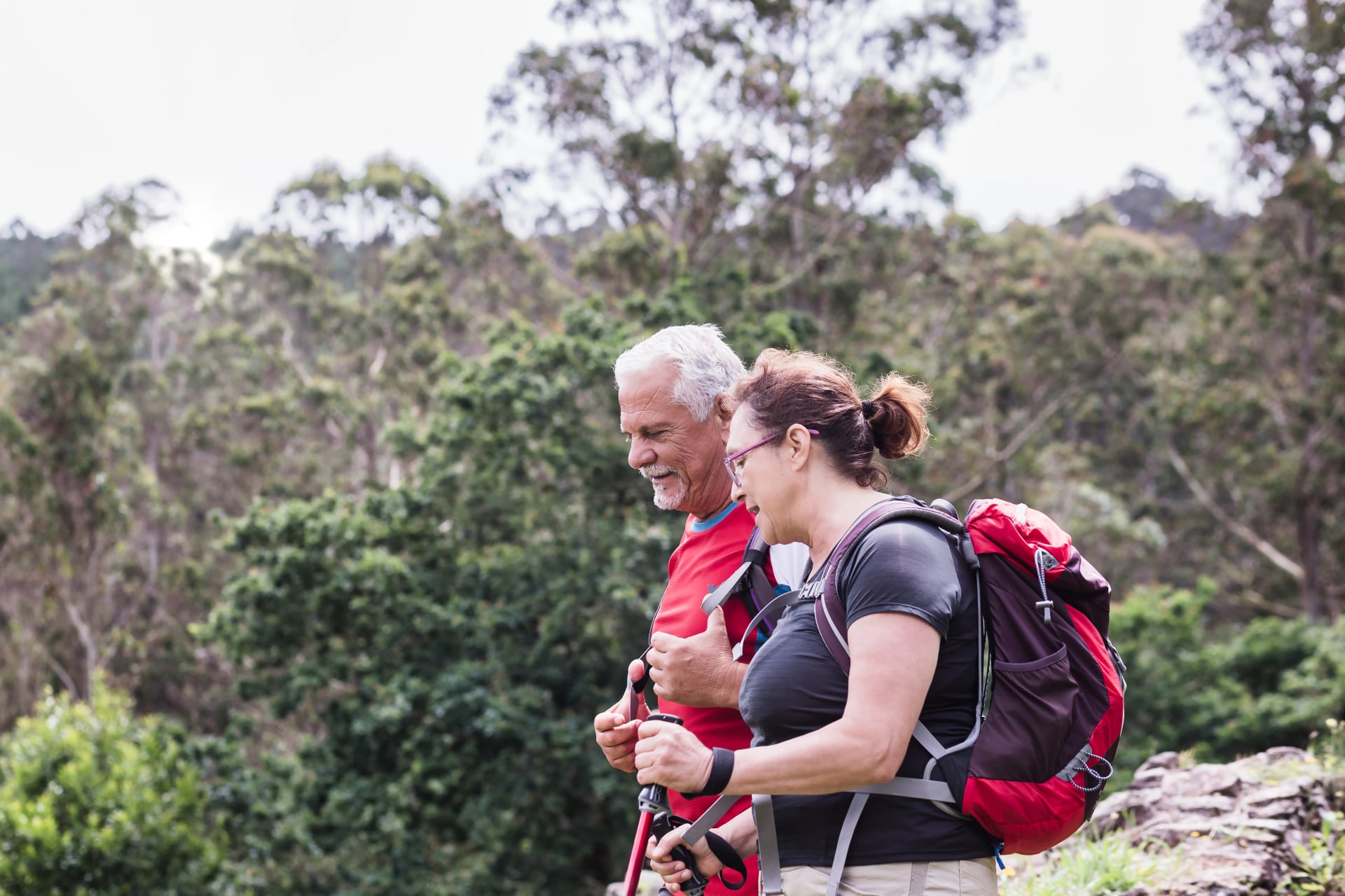 Active senior couple spiritual self-care travel way of St James. Retirement man and woman pilgrim