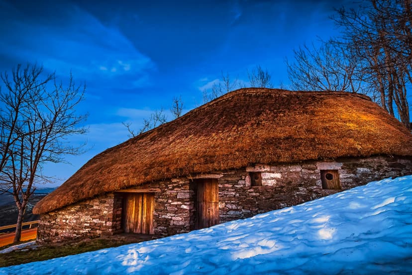 Traditional Celtic Thatched Roof Payoza House in the Town of O Cebreiro, Spain, along the Way of St James Pilgrimage Trail Camino de Santiago