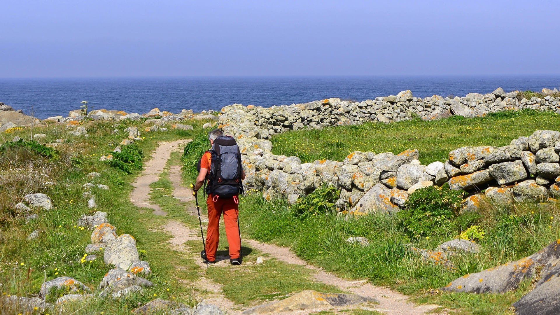 Lonely pilgrim on the Camino de Santiago near Baiona