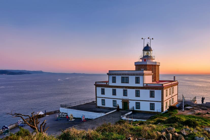Sunset in the Lighthouse of the Finisterre cape, Costa de la Muerte, Galicia. Northern Spain. One of the last stages in the jacobian way.
