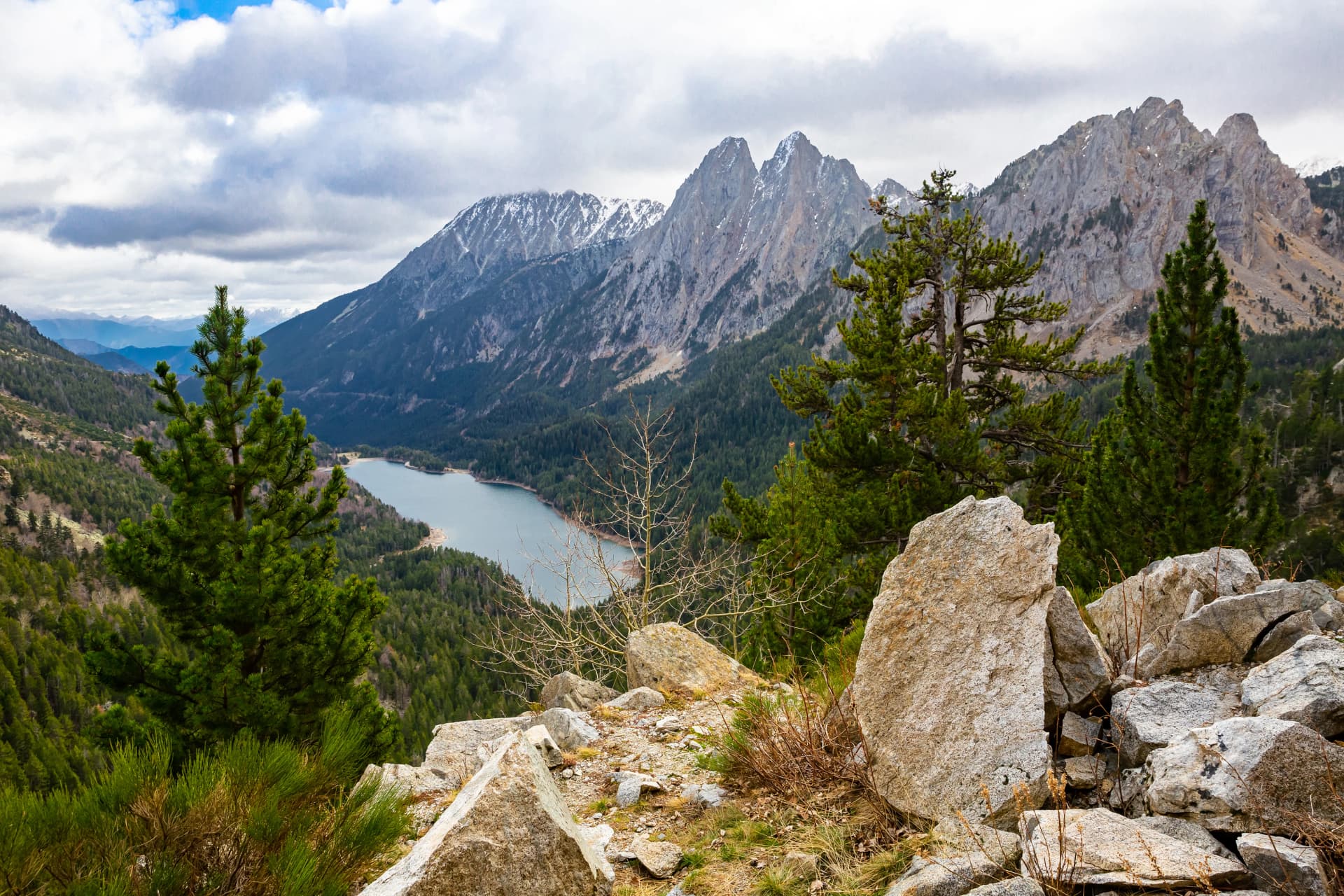 Top view of Els Encantats flowed in canyon in Estany de Sant Maurici in Espot in Spain