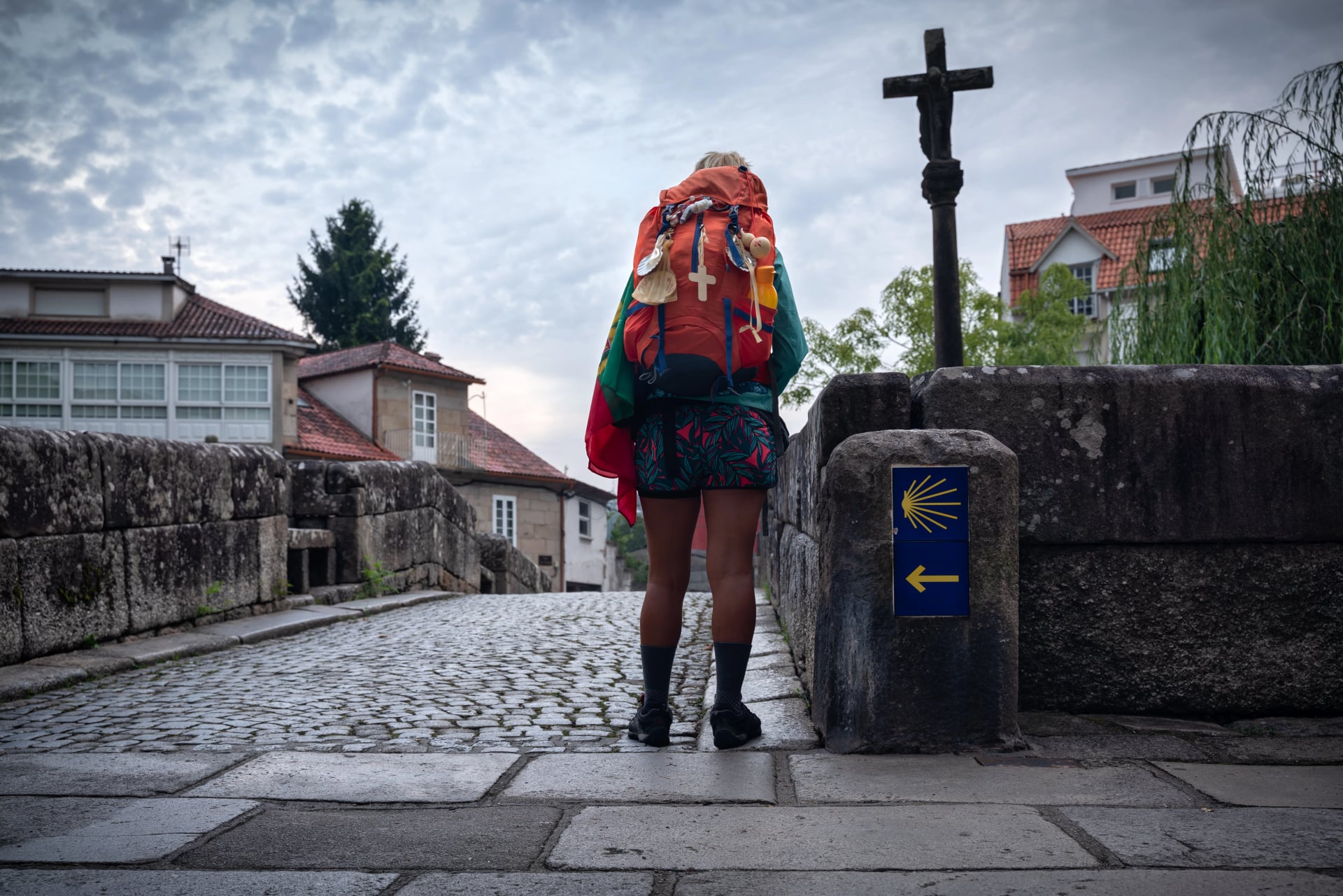 woman making the way to Santiago, passing through Caldas de Reis, Galicia, Spain.
