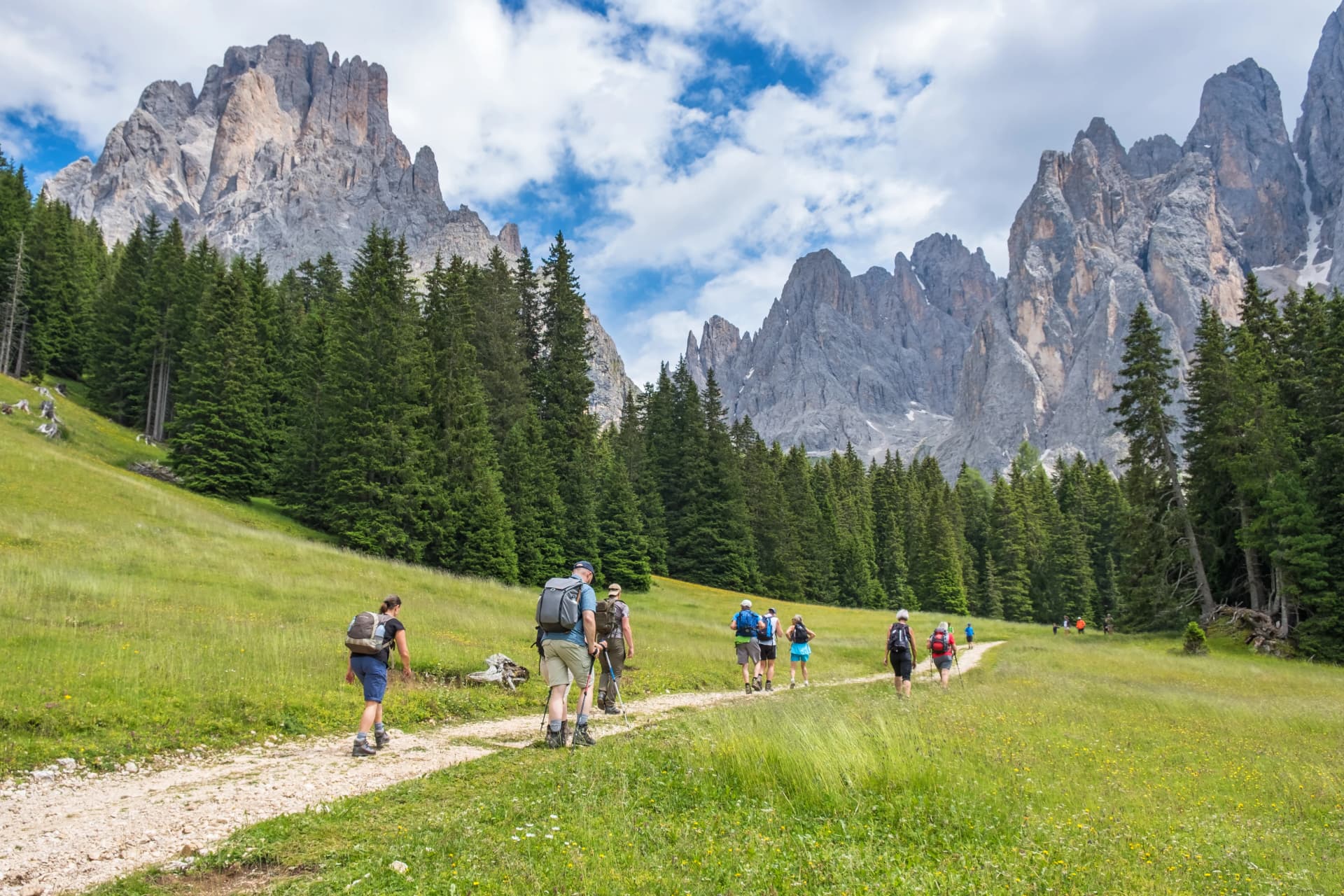 People hiking in the Dolomites Alps