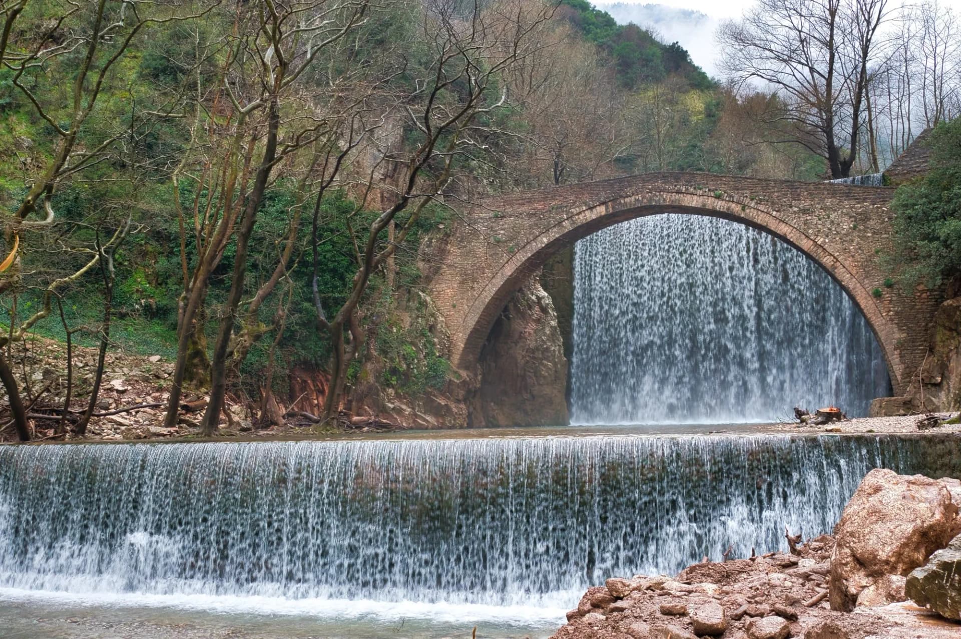 marvelous medieval stone bridge with two river waterfalls, Trikala, Elati, Paleokarya Waterfalls
