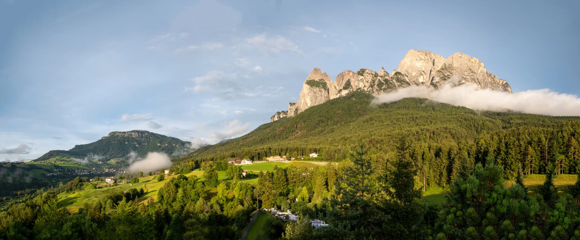 View of Monte Pez as sunset near Alpe Di Siusi and Seis am Schlern in Dolomites mountains Italy
