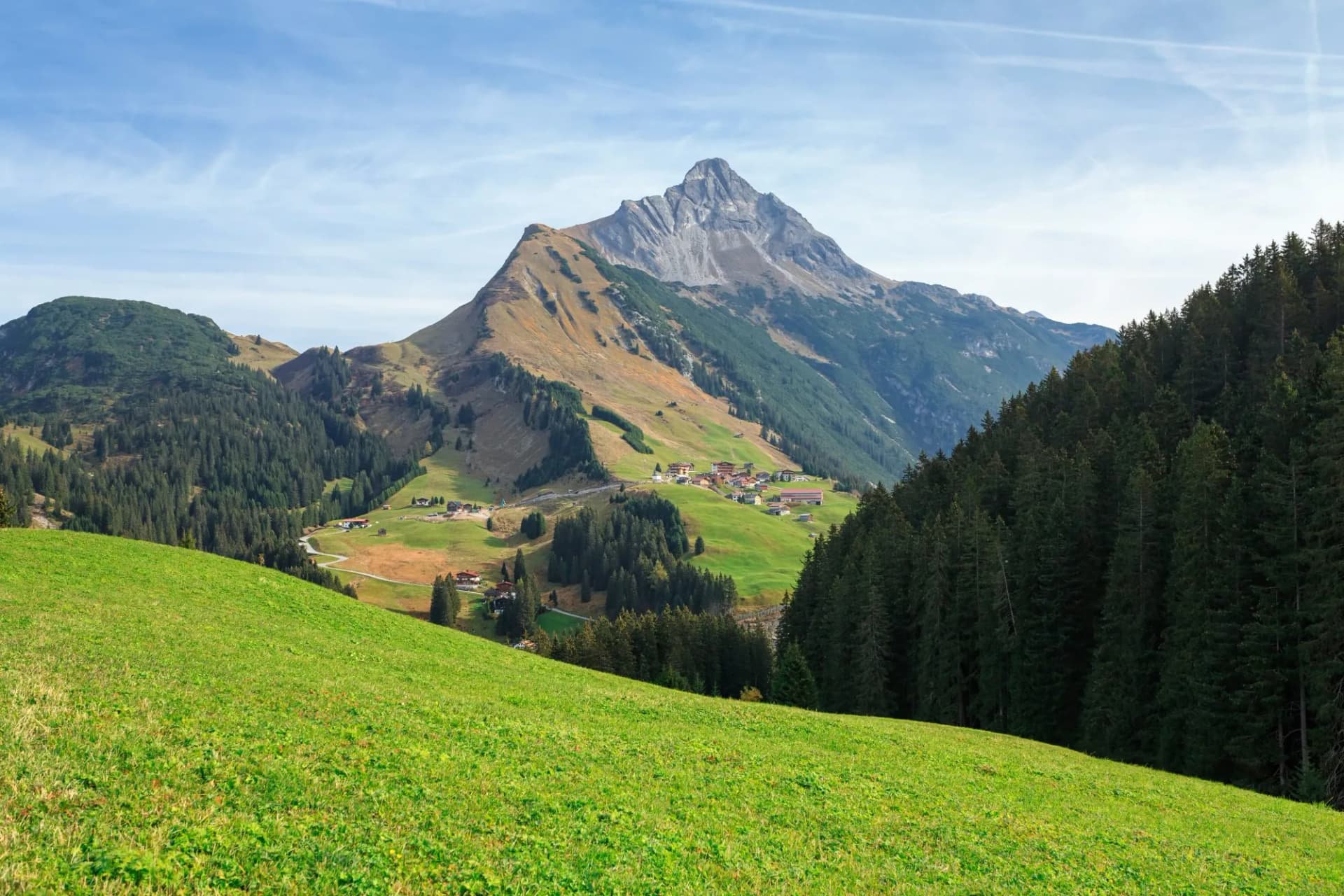 View towards the alpine village Lechleiten from the village of Warth. State of Vorarlberg, Austria.