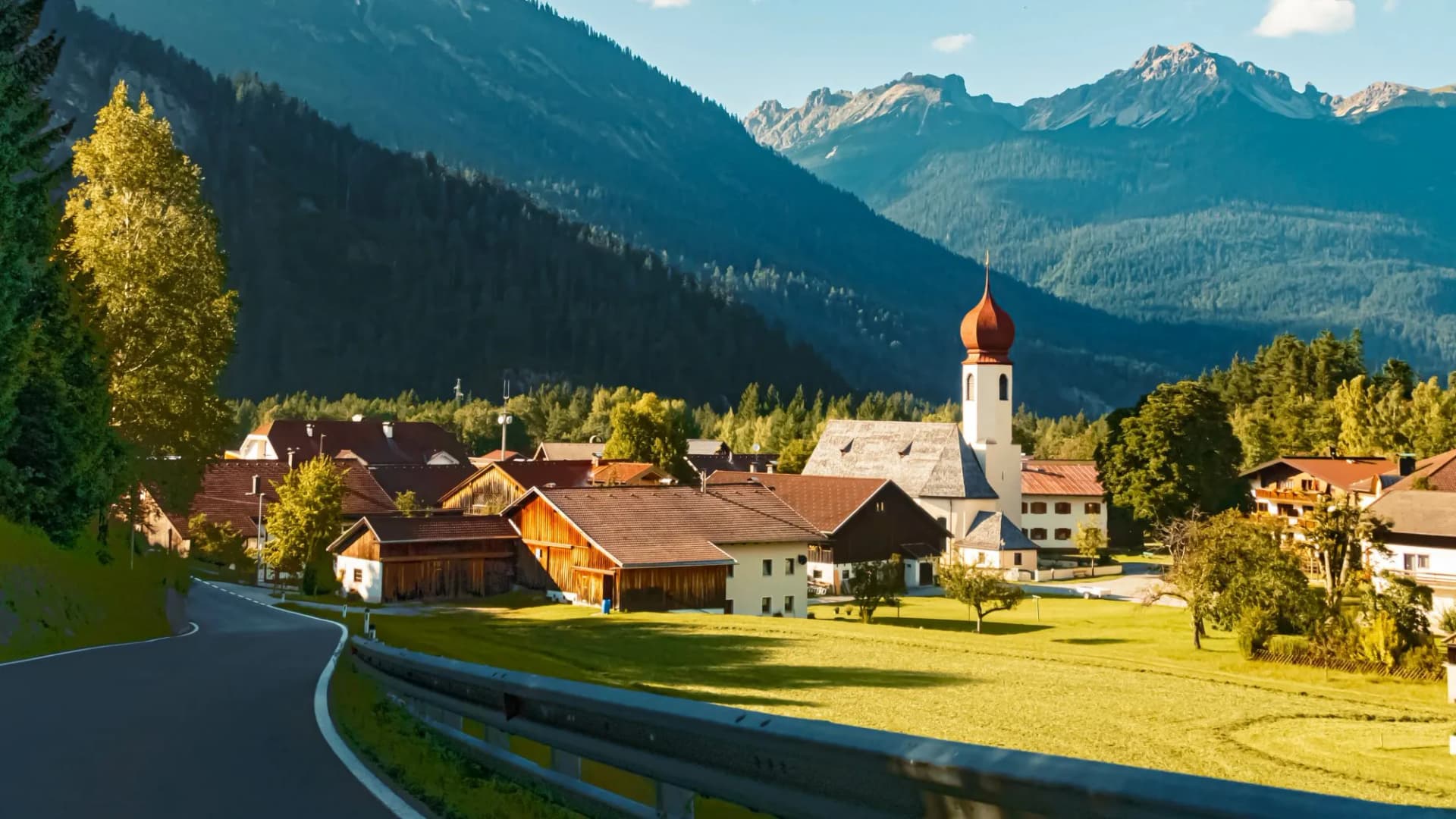 Beautiful alpine summer morning view with a church at Stanzach, Tyrol, Austria