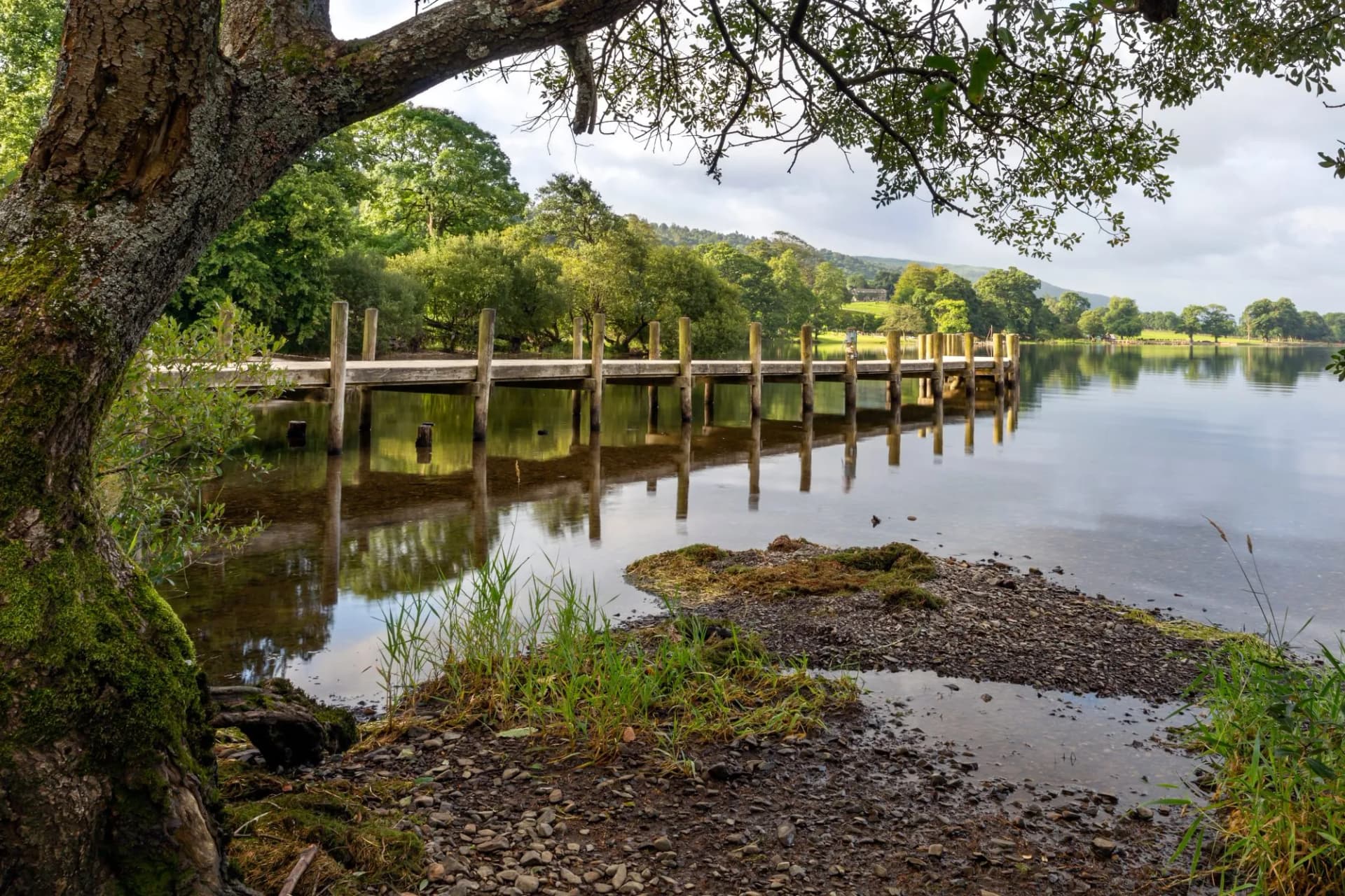 A lovely wooden jetty at Monk Coniston, located on the north shore of Coniston Water in the Lake District National Park.