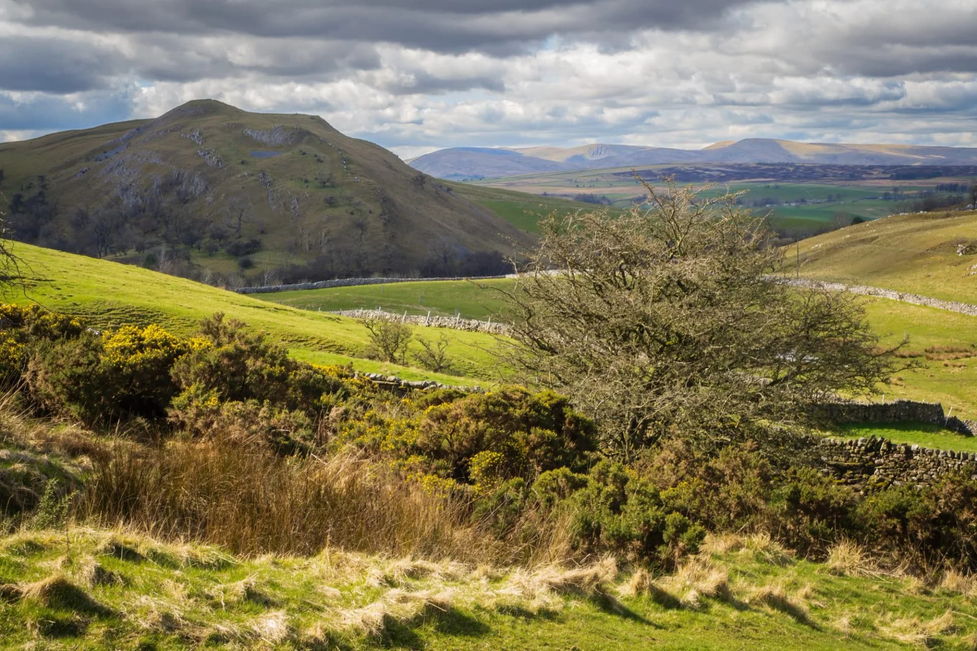 The coast to coast path leading from the summit of Nine Standards Rigg to Kirkby stephen