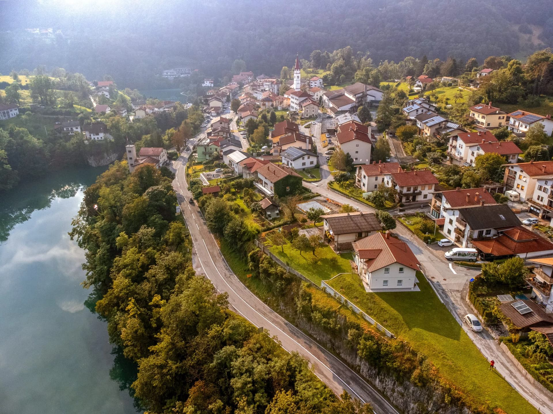 Aerial view of Most na Soci with Soca river in Slovenia at sunset